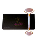 Rose Quartz Roller with gold accents on a black box labeled 'Miranda Secret' against a white background