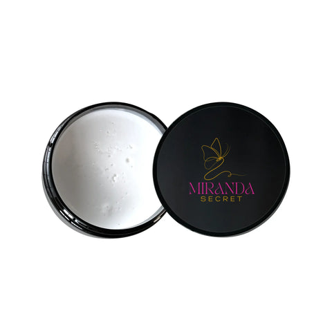 Open makeup compact with white powder and Miranda Kerr logo on a white background
