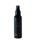 Black spray bottle with Miranda Kerr logo on a white background