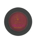 Miranda Secret makeup product with red shade on a white background