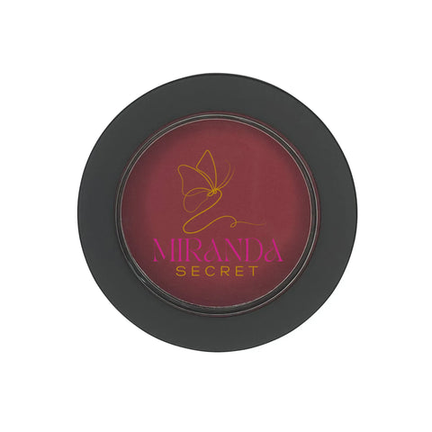 Miranda Secret makeup product with red shade on a white background