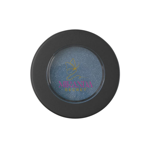 Makeup compact with blue shade and 'Miranda Secret' branding on a white background
