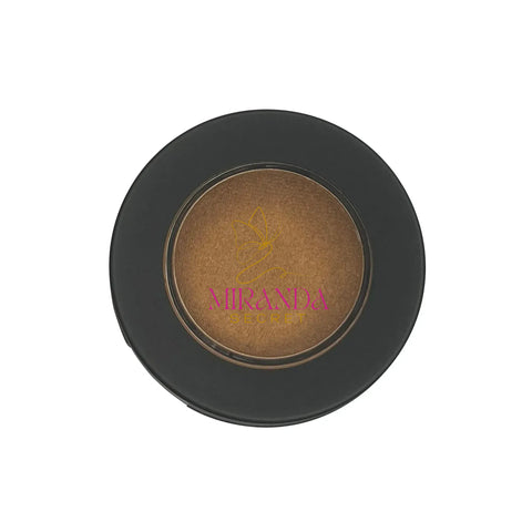 Makeup compact with brown powder and 'Miranda Secret' branding on a white background