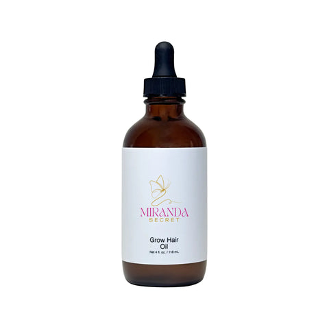 Bottle of Miranda Secret Grow Hair Oil with a dropper on a white background