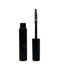 Black mascara with brush on a white background