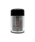 Silver glitter in a small transparent container with a black lid on a white background