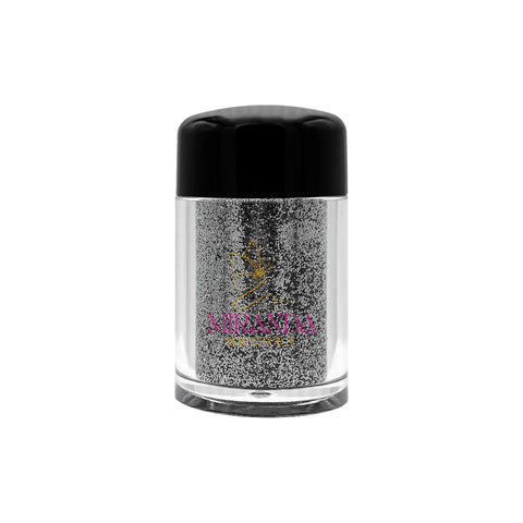 Silver glitter in a small transparent container with a black lid on a white background