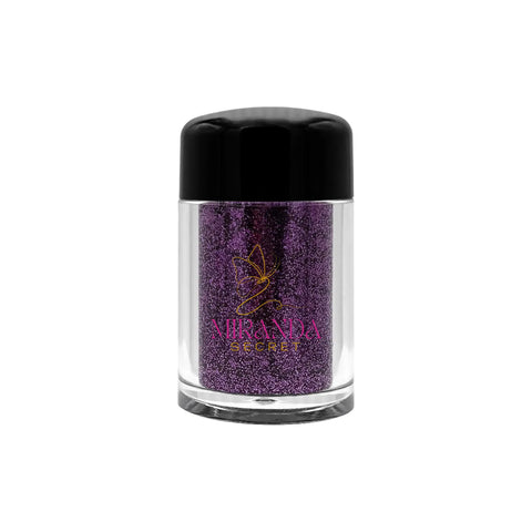 Purple glitter in a clear jar with black lid on a white background, featuring the Miranda Kerr brand.