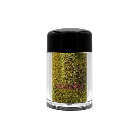 Jar of gold glitter with a black lid on a white background