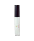 White cylindrical bottle with black cap on a white background