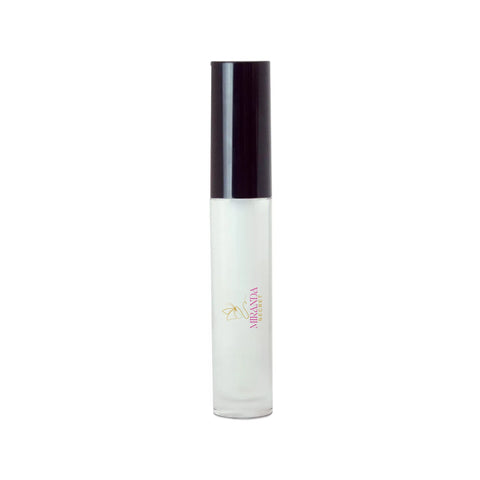 White cylindrical bottle with black cap on a white background