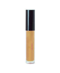 Cosmetic bottle with a black cap and beige body on a white background