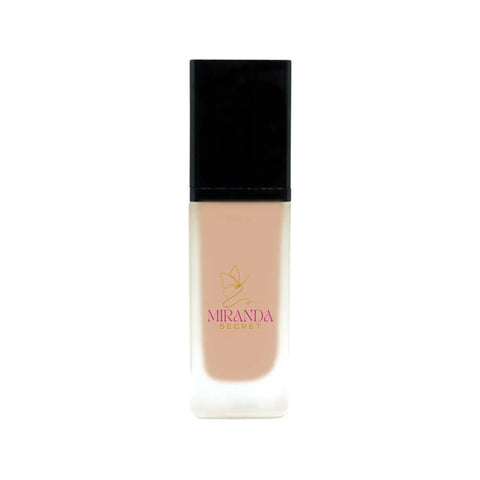 Foundation bottle with black cap and beige body on a white background