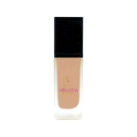 Foundation bottle with black cap and visible brand logo on a white background