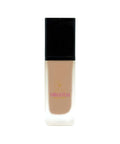 Foundation bottle with black cap and beige body on a white background