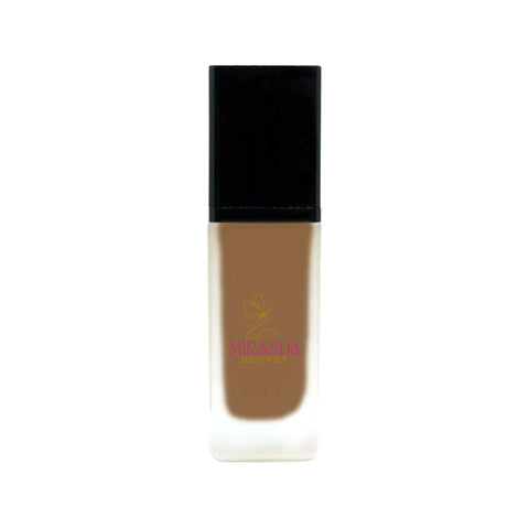 Foundation bottle with black cap and visible brand logo on a white background