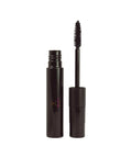 Black mascara with brush on a white background
