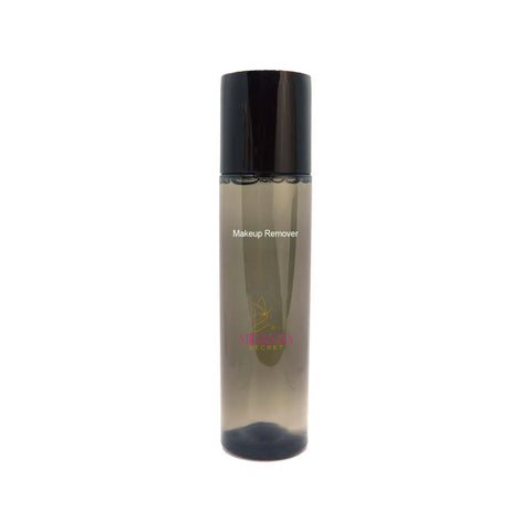 Makeup remover bottle with black cap on a white background