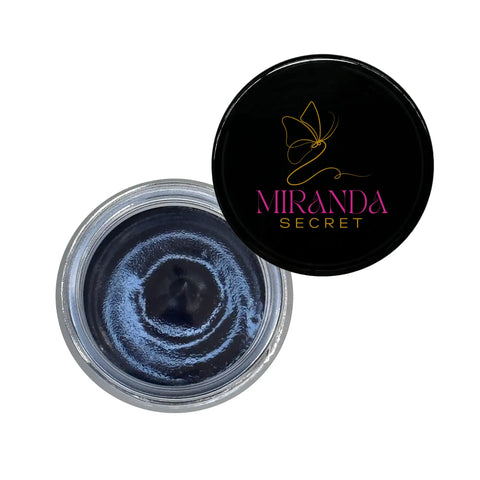 Open jar of blue powder with black lid featuring Miranda Secret logo on a white background