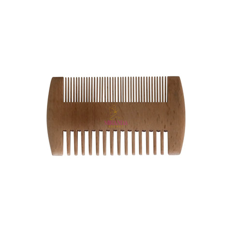 Wooden comb on a white background