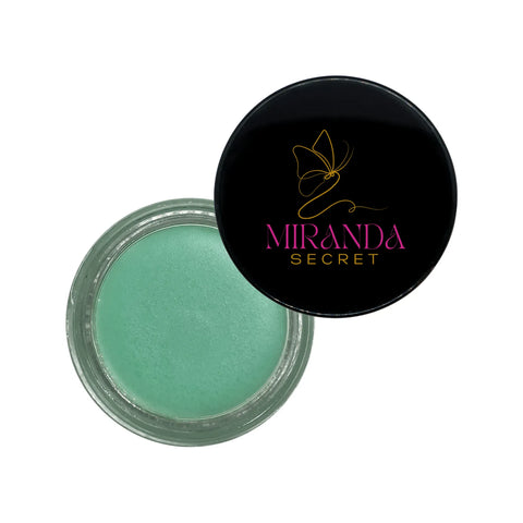 Green cosmetic product in a jar with Miranda Secret lid on a white background