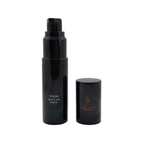 Black serum bottle with pump and cap on a white background