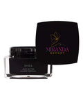 Black jar of Shea body butter with black lid and 'Miranda Secret' branding on a white background