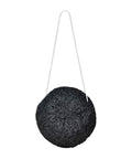 Black spherical object with a string on a white background