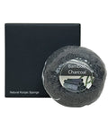 Bamboo charcoal natural konjac sponge with packaging on a white background