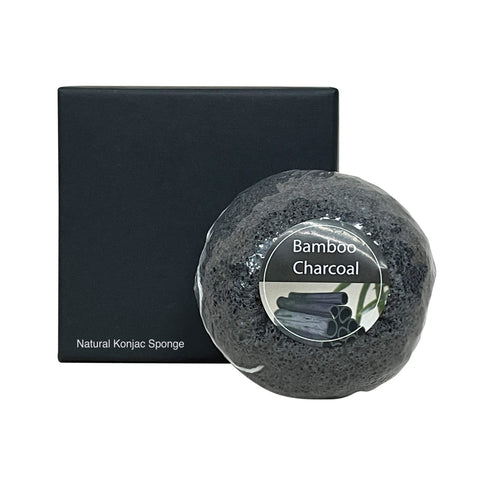 Bamboo charcoal natural konjac sponge with packaging on a white background