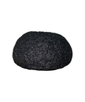 Black pumice stone on a white background