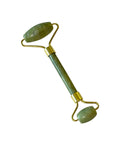 Green jade roller with gold accents on a white background
