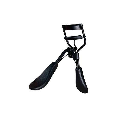 Black eyelash curler on a white background