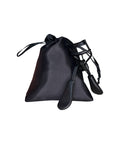 Black eyelash curler with a matching black pouch on a white background