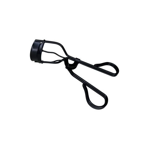 Black eyelash curler on a white background