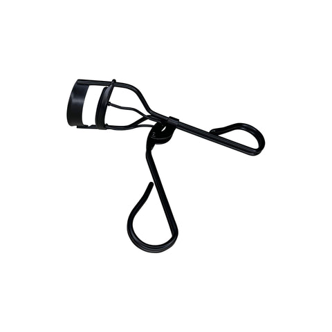 Black eyelash curler on a white background