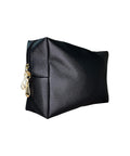 Black pouch with gold zipper on a white background