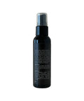 Black spray bottle with silver nozzle on a white background