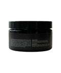 Black jar with text on a white background