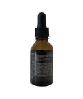 Brown glass dropper bottle with black cap on a white background