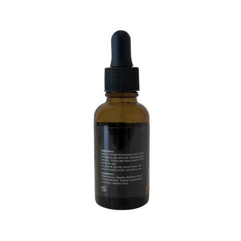 Brown glass dropper bottle with black cap on a white background