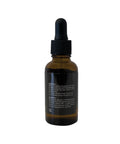 Brown glass dropper bottle with black cap on a white background
