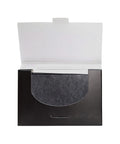 Black leather case with a white interior on a white background