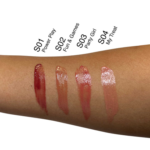 Lip oil swatches on a arm with color names and codes.