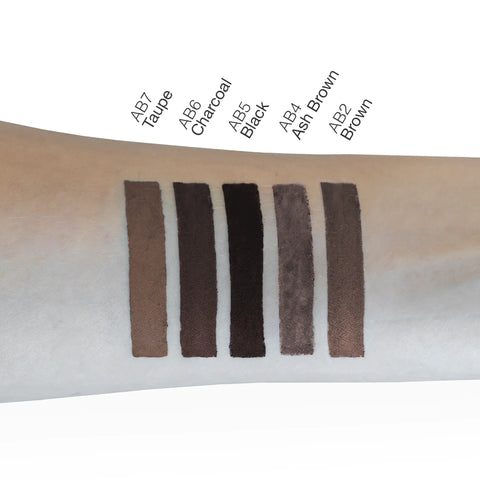 Swatches of different brown shades on a person's arm with color names above them.