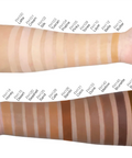 Color swatches on a person's arm with labeled shades of makeup.