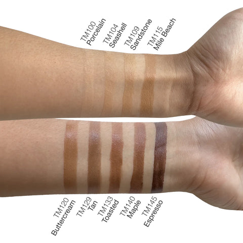 Swatches of different makeup shades on a person's arm with color names below.