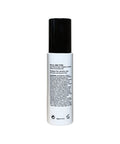 Skincare bottle with black cap and white label on a white background