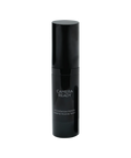 Black cosmetic bottle labeled 'Camera Ready' on a white background