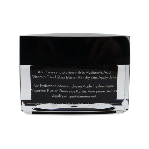 Cosmetic jar with black lid and clear body on a white background